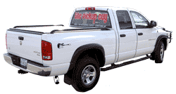 Dodge with Truxedo tonneau cover, step bars, grille guard, towing products, graphics