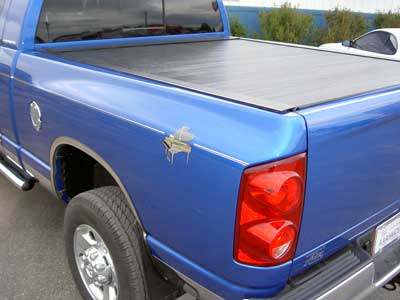 Dodge truck with Pace Edwards Bed Locker tonneau cover, step bars, accessories